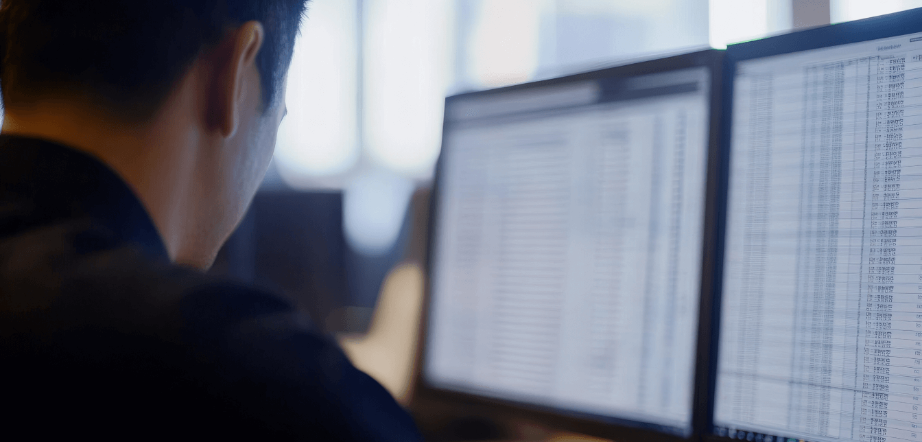 Person checking flight information on a screen