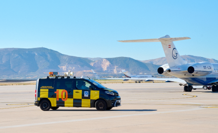 Small truck heading towards airplane