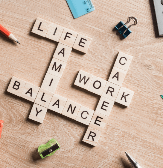 Wooden crossword depicting words work life balance