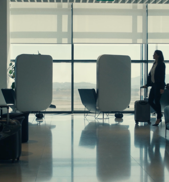 Person using a laptop at the business lounge of Athens International Airport